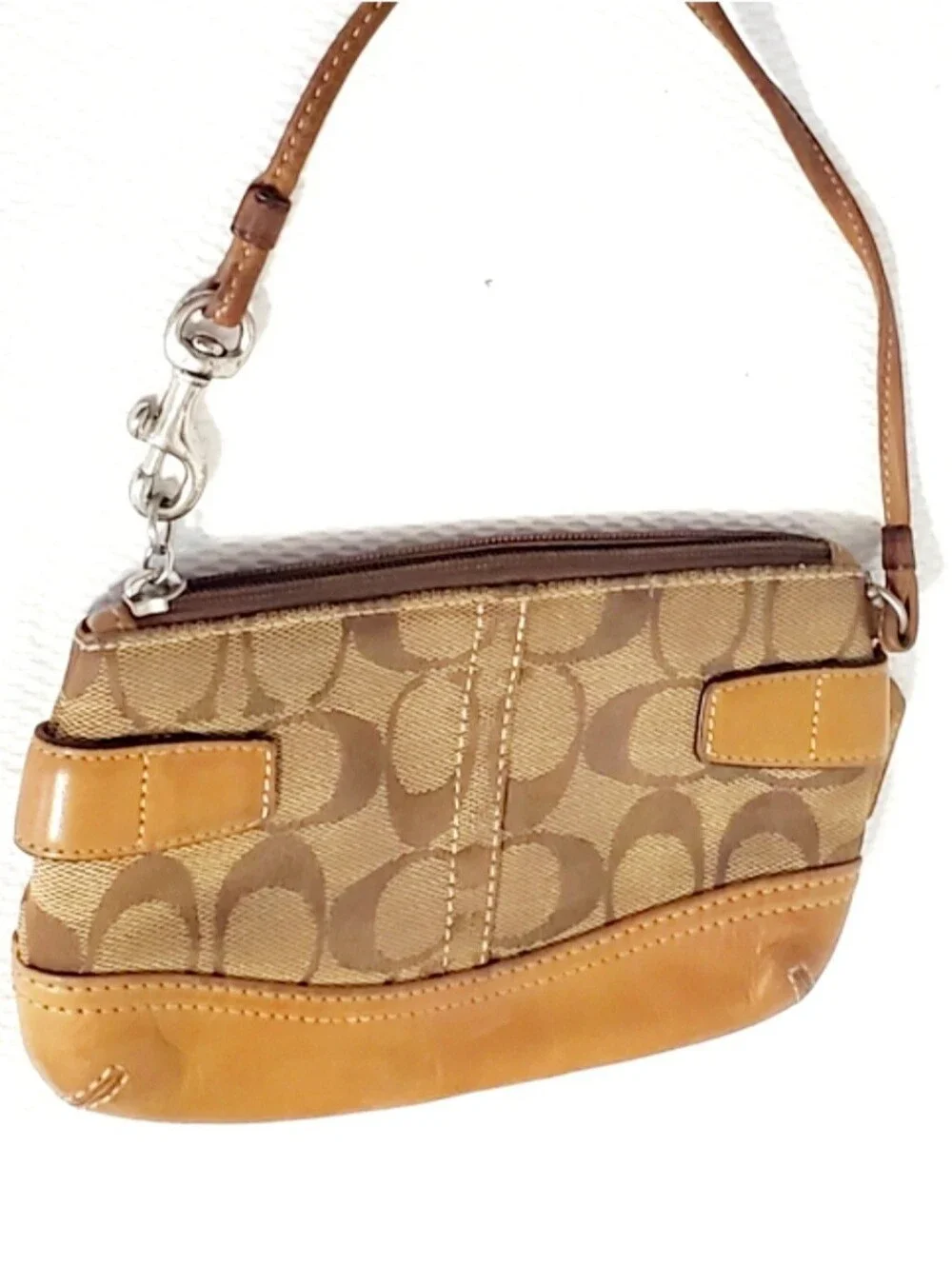 Coach Buckle Signature Canvas And Vachetta Leather Wristlet